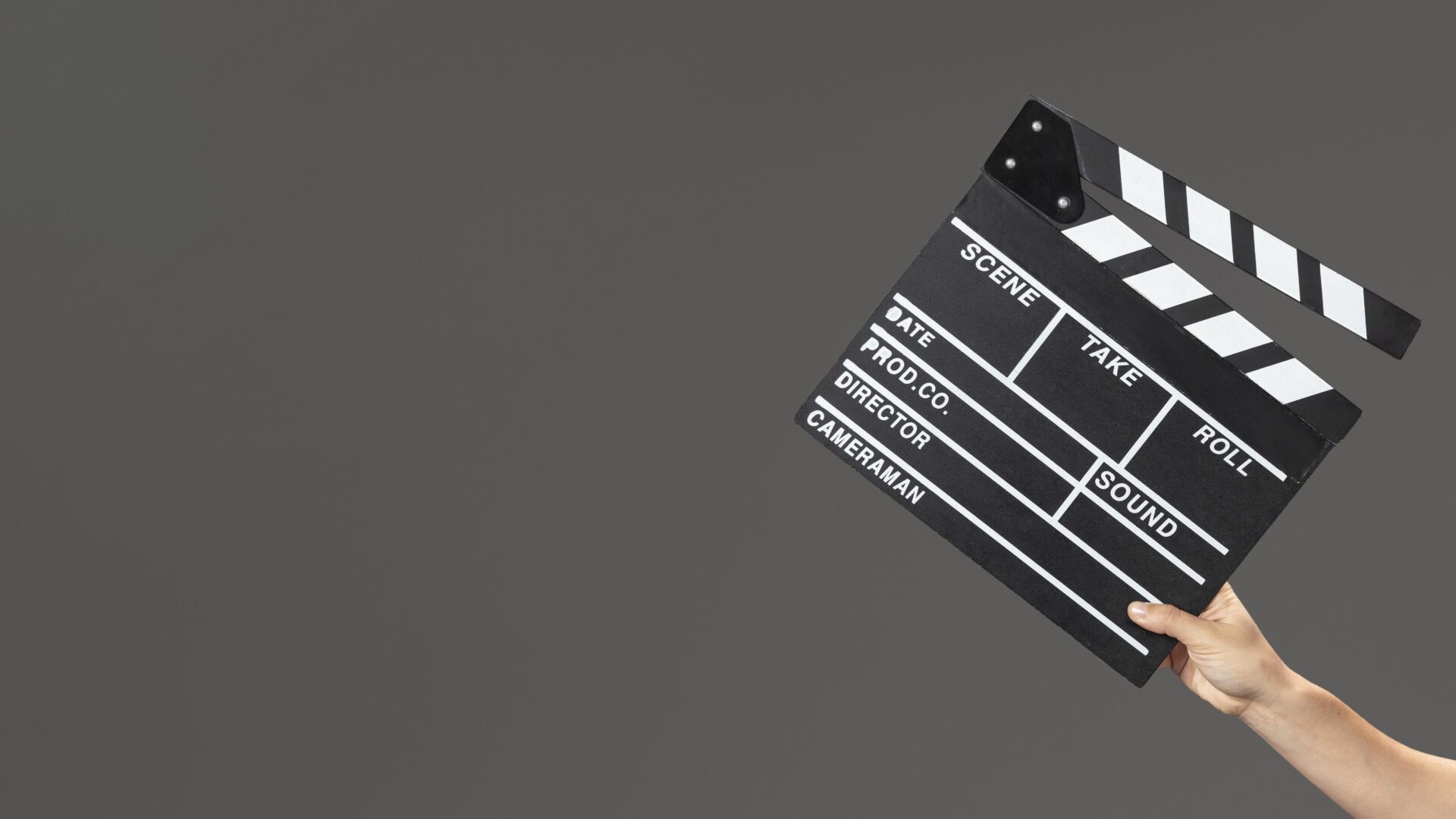 hand-with-movie-slate